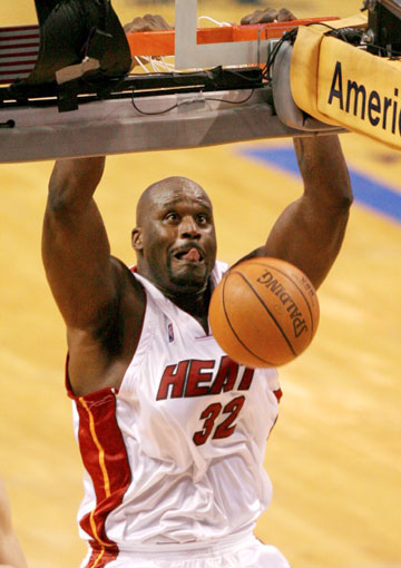 Miami Heat center Shaquille O'Neal dunks against the Detroit Pistons in the first half during Game 6 of the NBA Eastern Conference Finals in Miami June 2, 2006.