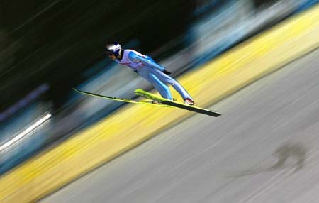 Austria's Gregor Schlierenzauer soars through the air during the qualification for the normal hill HS 100 ski jumping competition at the Nordic World Ski Championships in Sapporo, northern Japan March 2, 2007.
