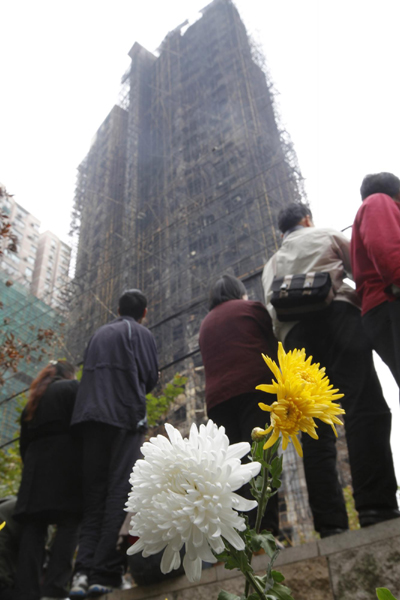 Thousands mourn fire victims in Shanghai