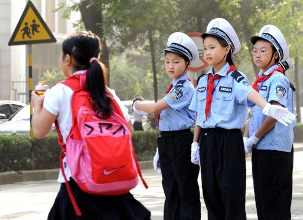 Children take charge of the road