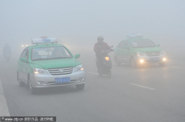 Dense fog shrouds east and north China