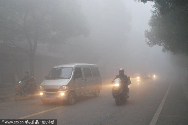 Dense fog shrouds east and north China