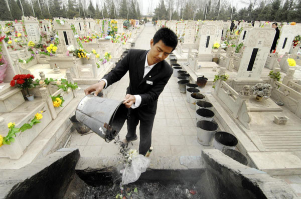 Cemetery worker helps keep resting place neat