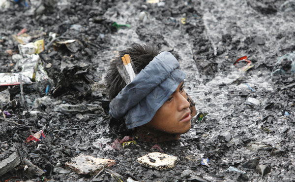 These photographs tugged at the heartstrings of judges to win the top prizes of the Third Annual Asian Press Photo Contest recently. A sea of emotions