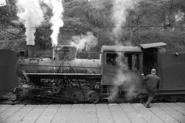 Winding through green mountain ranges, whistling and steaming, Jiayang mini steam train has run for almost half a century and is China's only steam train that is still in operation. Photos by Wang Bin / for China Daily China's only existing steam train