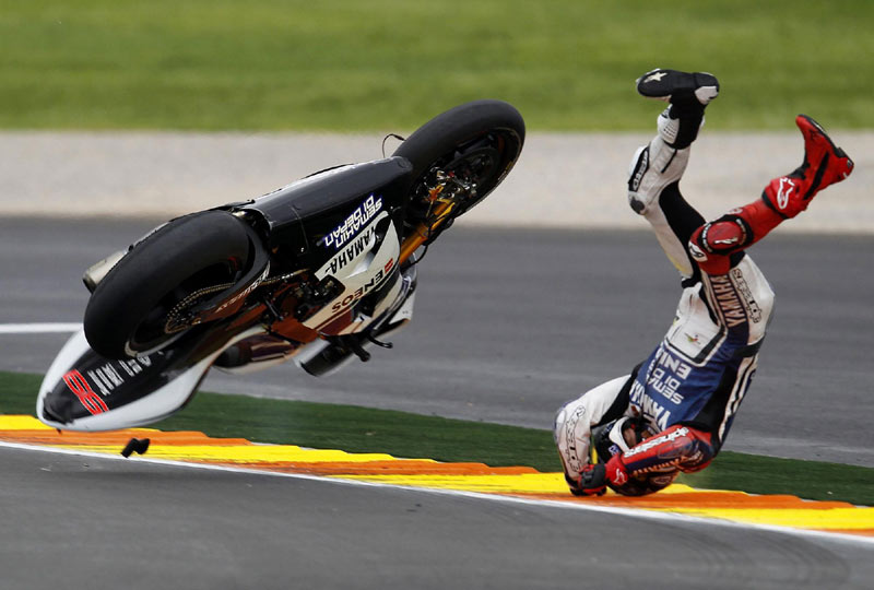 Yamaha MotoGP world champion rider Jorge Lorenzo falls during the Valencia Motorcycle Grand Prix at the Ricardo Tormo racetrack in Cheste, near Valencia, on Nov 11, 2012. 2012 Sports Photos in Review: Accidents on the court