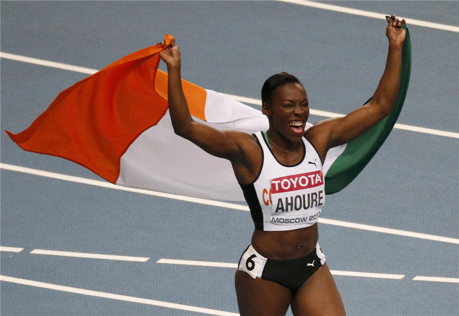 Murielle Ahoure of the Cote d' Ivoire celebrates winning second place in the women's 100 metres final Faces of triumph and defeat at athletics worlds