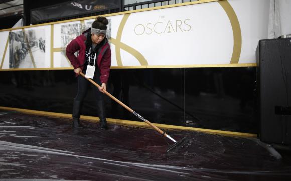 Fashion disaster? Downpour douses Oscars red carpet