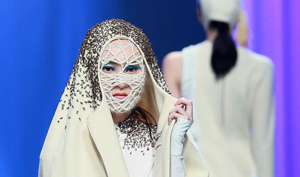 Designers present creations at China Fashion Week<BR>