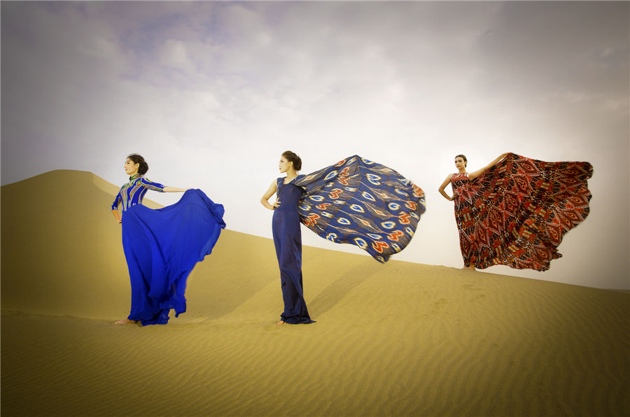 Models heat up Xinjiang desert with Atlas silk