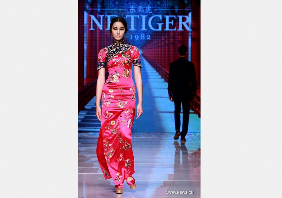 Qipaos sizzle on the runway as China Fashion Week kicks off