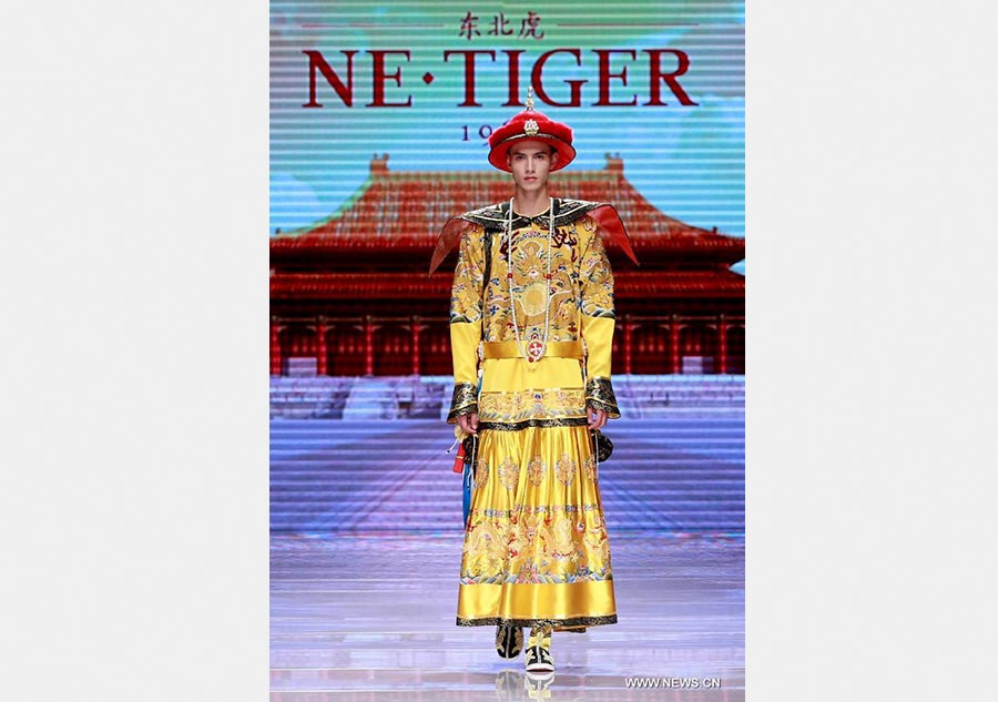 Qipaos sizzle on the runway as China Fashion Week kicks off