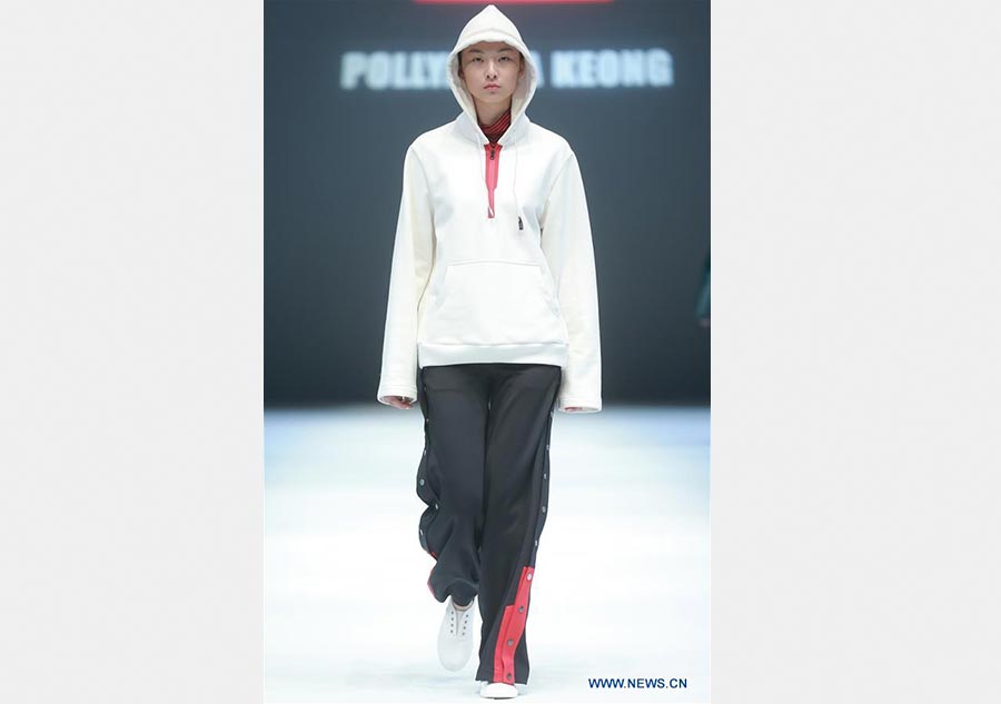 Models present creations of Jiang Yueyin at China Fashion Week