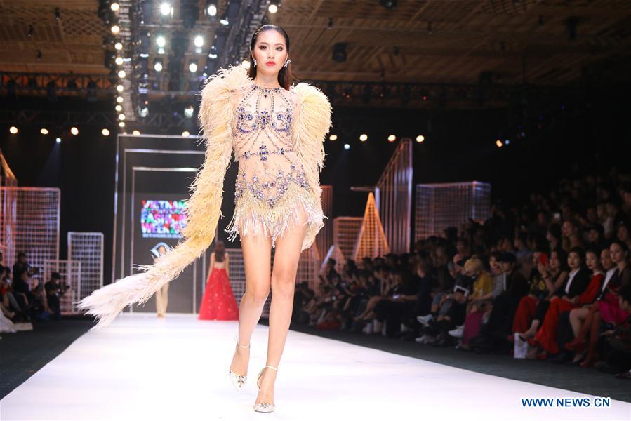 Models present creations at Vietnam Int'l Fashion Week