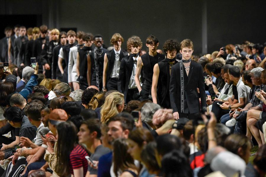 Models present creations of Dior Homme