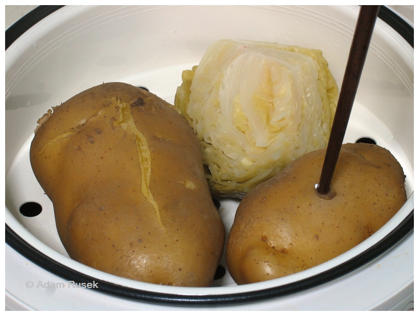 Fried Polish sausage with steamed potatoes and cabbage