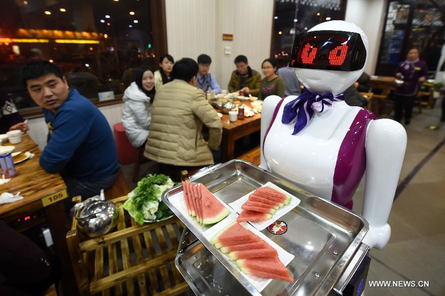 Robot waiter serves customers in Xuchang