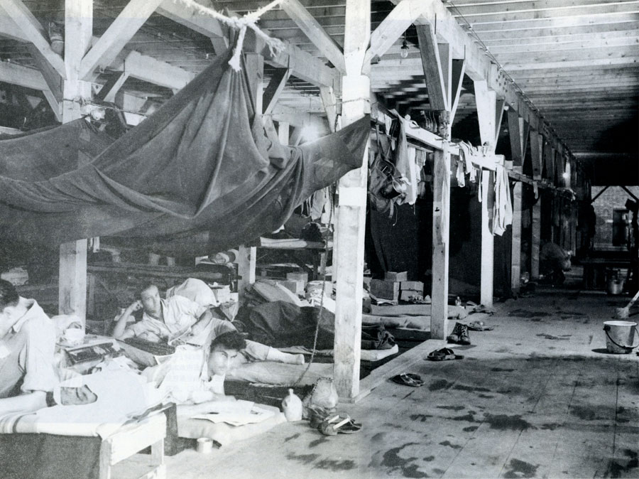 Inside the POW camp barracks