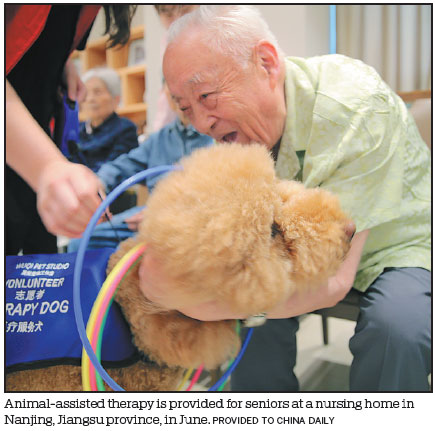 SENIORS, AUTISTIC CHILDREN WARM TO CANINE COMPANIONS