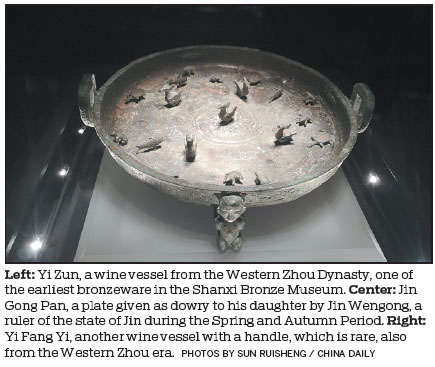 Shanxi museum unveils rare bronze relics