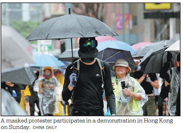 Experts defend law against face masks in HK