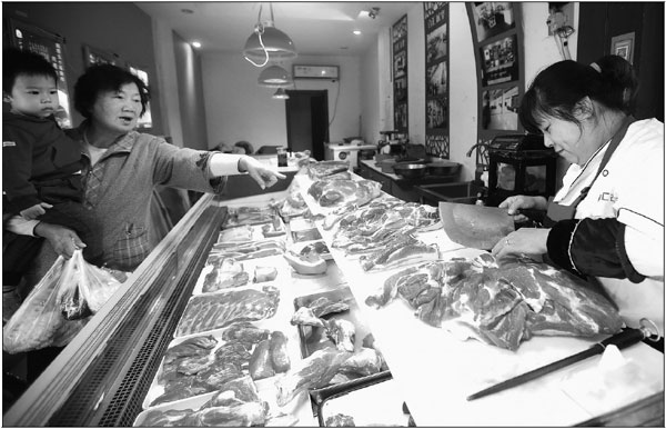 China plans more measures to help stabilize pork prices