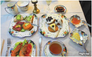 105 Afternoon high tea; sandwiches, smoked salmon, seafood and sliced beef