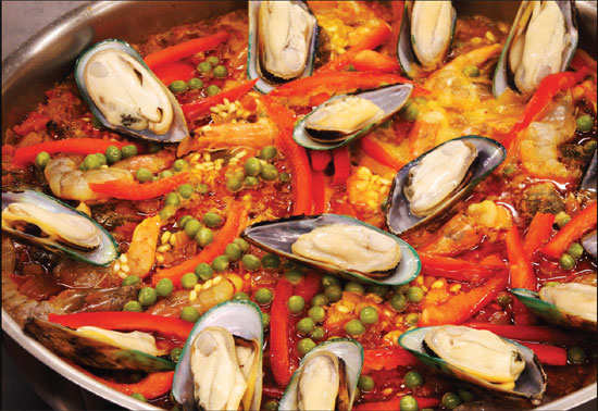 Call it mariscada, seafood rice or paella the heart is rice