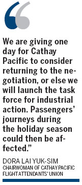Cathay flight attendants threaten holiday action