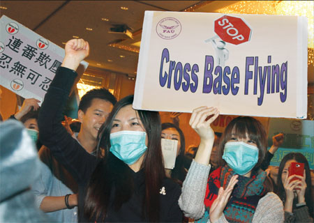 Cathay union threatens undated full scale strike