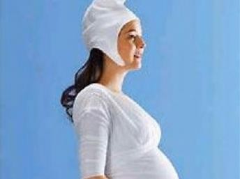萨科齐用孕妇海报宣传贷款计划遭抨击