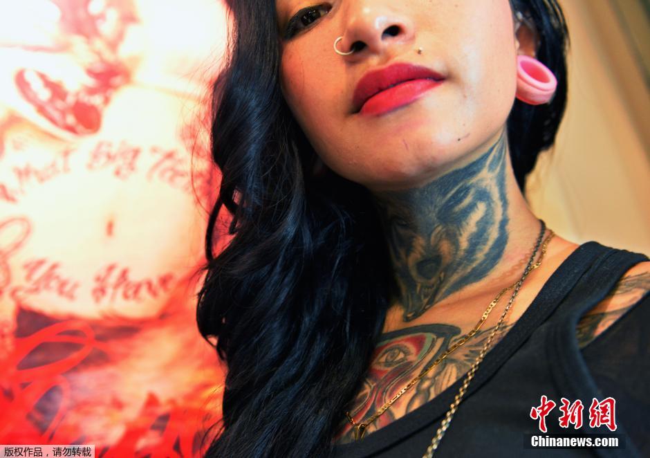 秘鲁举办纹身大会 另类艺术彰显个性(高清组图