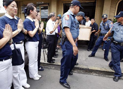 菲警方自称表现“不丢脸” 劫持现场成观光景点?