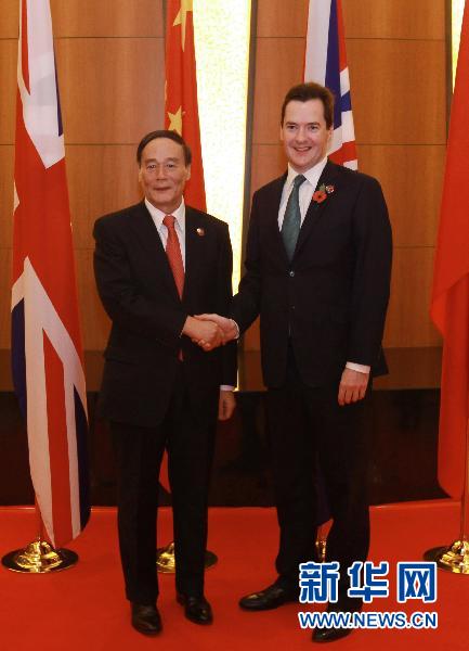 中英承诺加强全球经济治理等领域合作