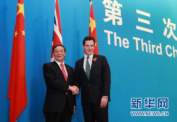 中英承诺加强全球经济治理等领域合作