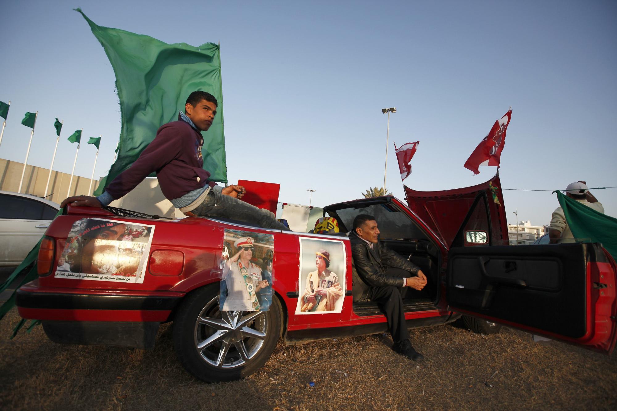 北约宣布接管对利比亚军事行动 卡塔尔助反对派售石油