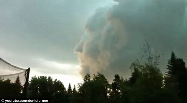 加拿大摄影爱好者拍到奇特“人脸”云团（图）