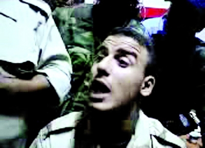 卡扎菲尸检择日公布 穆巴拉克悲痛至脑死亡？