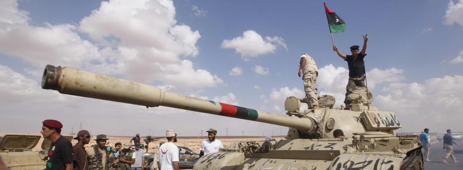 西方联军空袭利比亚 “义战”还是“侵略”