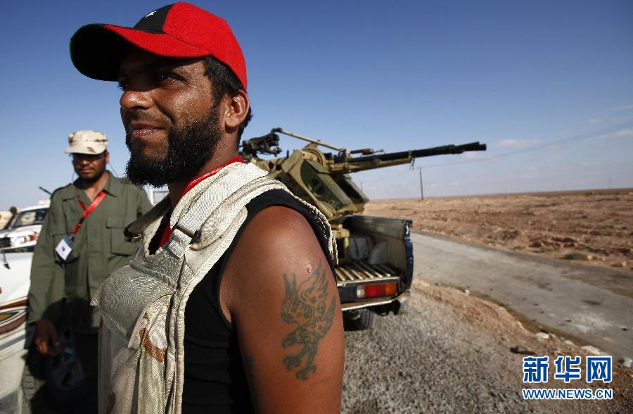 利比亚执政当局在卡扎菲老家进攻因人体盾牌受阻