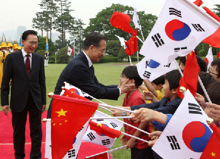 李明博举行仪式欢迎温家宝总理