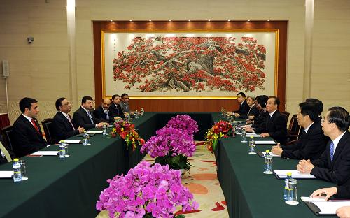 温家宝会见巴基斯坦总统扎尔达里