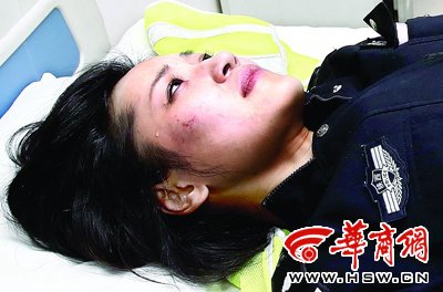 西安警牌车碾断女交警手臂 警方称系套牌