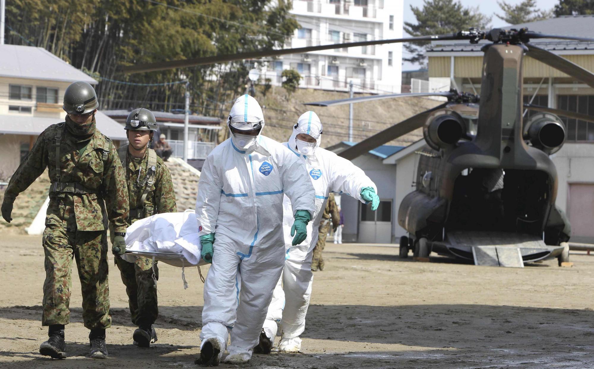 日本进行最大规模救援 中国首次派出救援队赴日