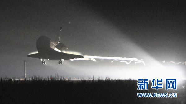 美航天局首次公布航天飞机与空间站对接照片和视频