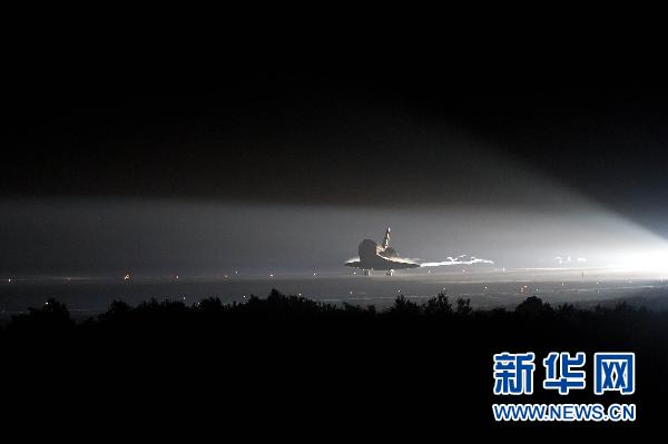 美航天局首次公布航天飞机与空间站对接照片和视频
