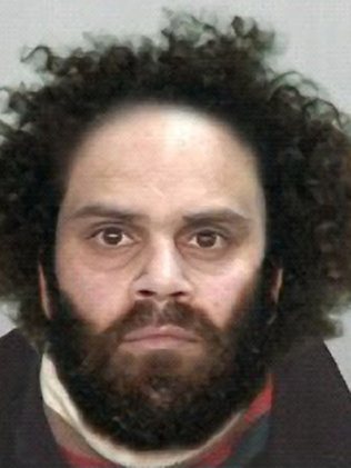 澳大利亚头号通缉犯落网 潜逃7年终被警犬“打败”