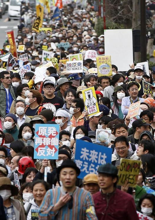 安倍发表东日本大地震两周年寄语 称将加速重建