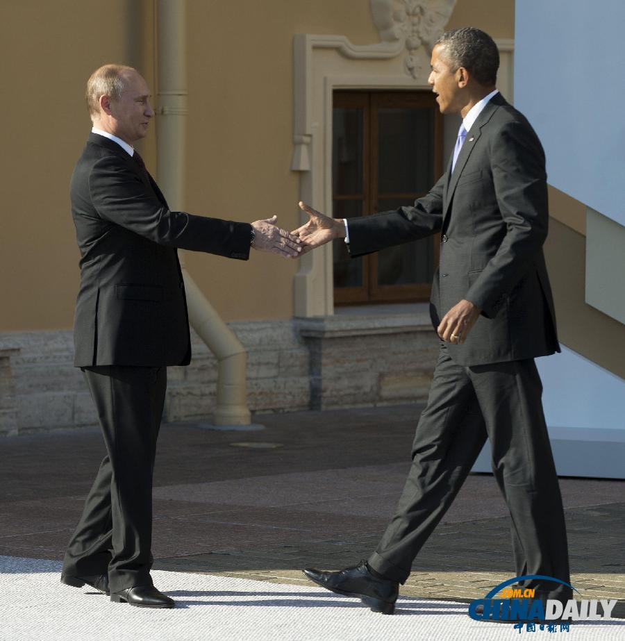 g20峰会:奥巴马与普京握手后转身离开