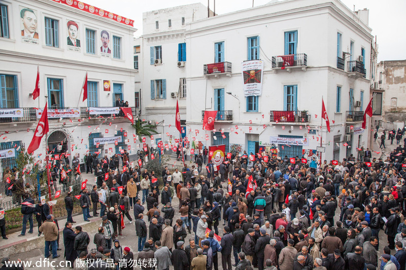 突尼斯茉莉花革命三周年 民众踩踏前总统画像